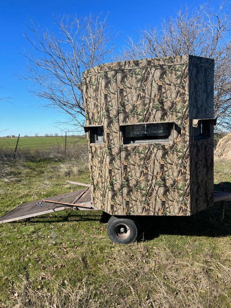 Wheelchair accessible hunting blind built by volunteers from the Texas Hunting & Fishing Guides for Veterans nonprofit, set up in a North Texas field