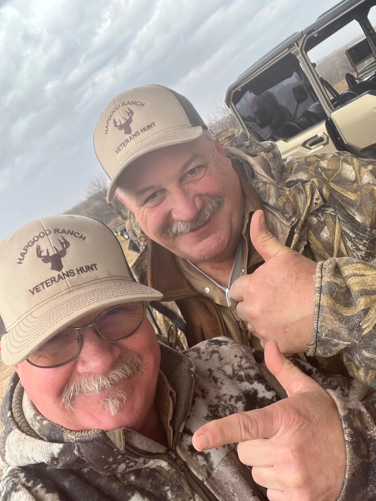 Volunteer hunting guides supporting veterans during a field trip
