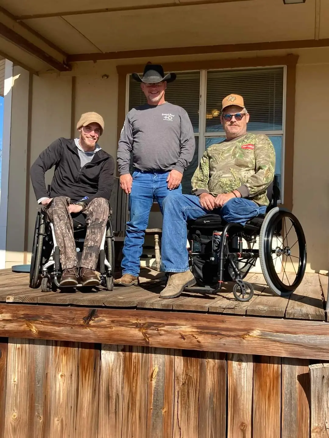 Volunteers and veterans sharing a moment outdoors
